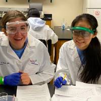 Girls competing in chemistry event